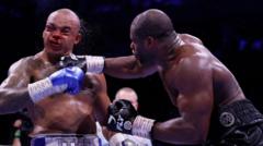 Dubois sobrevive a caídas y conquista título WBO